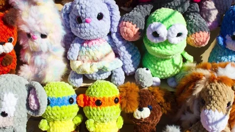 A soft knitted turtle toy. A brightly colored children's turtle toy,animation Stock Footage 341590160