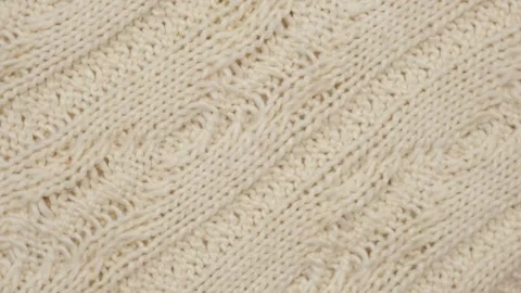 Soft Knitted Woolen Detailed Texture. Natural Fabric Closeup Knit Pattern. Beige Stock Footage 276420984