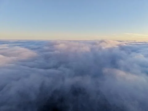 Soft Layered Cloud View With Tranquil Hues, Minimalist Aerial Depiction Of Calm Stock Photos