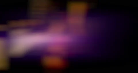 Soft lens flare effect with an orange hue glowing from the right in the Radium Stock Footage 145883415