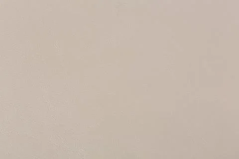 Soft light beige leather texture. Can be used as background in art or design Stock Photos