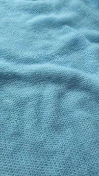 Soft Light Blue Knitted Wool Fabric Texture With Gentle Waves Stock Photos