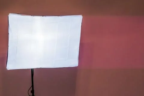 Soft light box in closeup isolated on a pink wall background, Basic photo stu Stock Photos
