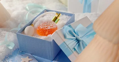 Soft light brightens the perfume Christmas gift. Stock Footage 345459576