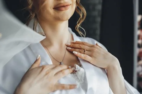 Soft light glows on a bride's gentle smile Foto stock