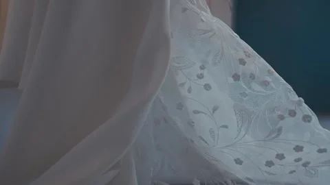 Soft Light Moving Across Elegant Lace Wedding Dress Stock Footage 340549312