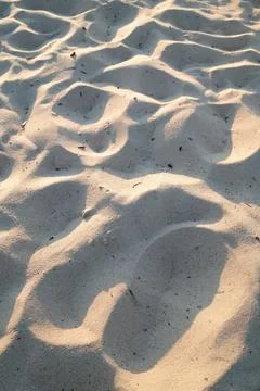 Soft light on textured white sand Stock Photos