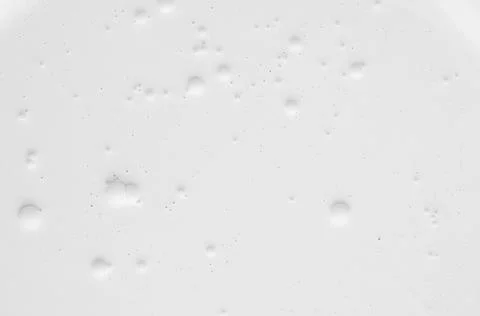 Soft light white fluid paint background with many large round bubbles as abst Stock Photos