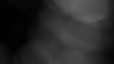 Soft Luminous White Bokeh Lights Shifting and Flowing on Black Background. Video stock 305870930