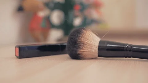 Soft makeup brush and liquid lipstick Stock Footage 128571759