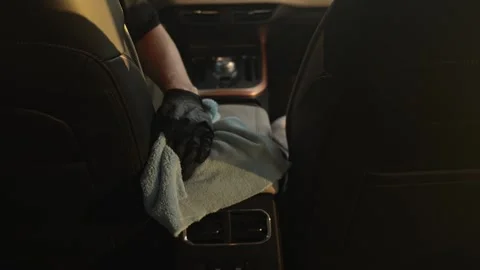 Soft Microfiber Cloth Carefully Smooths Leather Armrest Stock Footage 335214039