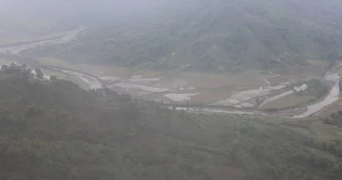 Soft mist drifts through the lush hills of Meghalaya Stock Footage 335668153