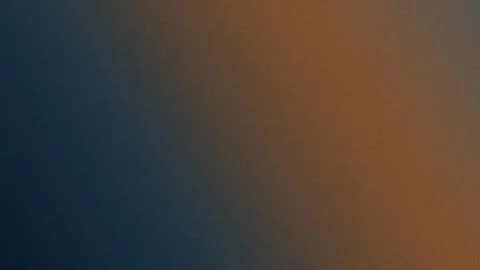 A soft, moody gradient blends deep blue into warm amber tones, creating a c.. Stock Illustration