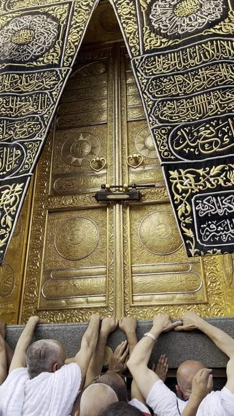 Soft morning light gently caressing the doors of the Kaaba Stock Footage 242752392