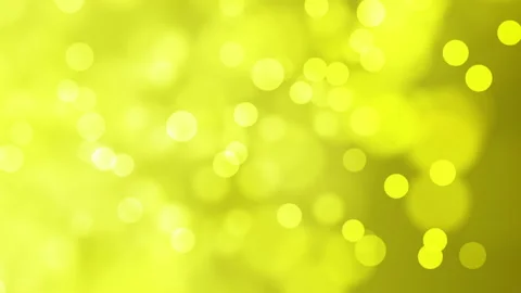 Soft Moving Gold Particles On A Greenish Yellow Background - 4KVideo Stock Footage 168053448