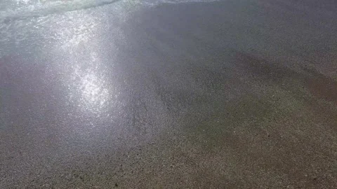 Soft Ocean Wave Foam Lapping on Sandy Beach Shore Stock Footage 326305449