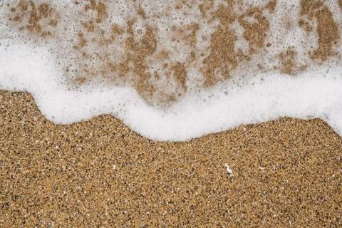Soft ocean wave on sandy beach, background Foto stock