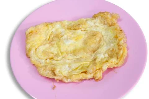 Soft omelet on pink plate Stock Photos