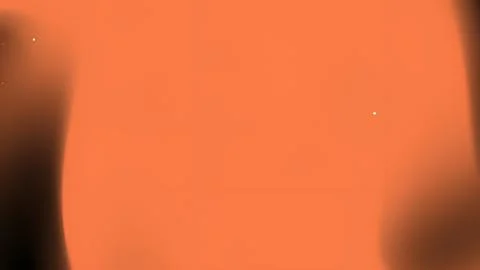 A soft orange background with subtle dark shading. Stock Photos