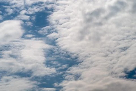 Soft overcast sky clouds creating uniform textured blanket and muted light,.. Stock Photos