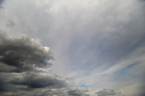 Soft overcast sky layered with clouds, subdued gray tones and gentle gradie.. Stock Photos