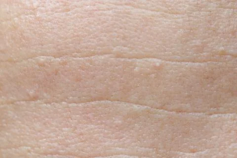 Soft, pale skin texture with fine, natural lines Stock Photos