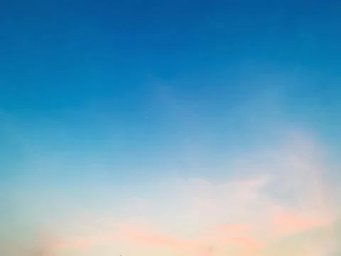 Soft Pastel Clouds in Blue Evening Sky Over Jakarta Indonesia Stock Photos