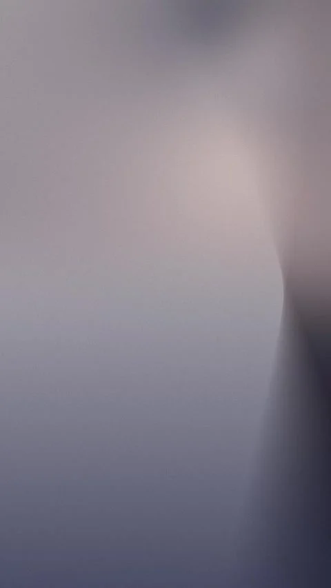 Soft pastel gradient with blurred hues of purple and gray. Seamless loop Stock Footage 309701187