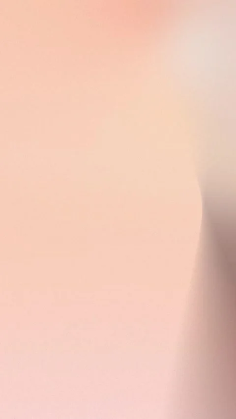 Soft pastel gradient with peach and beige tones, smooth texture, seamless loop 動画素材 309956382