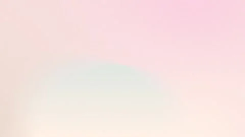 Soft pastel gradient with pink and green hues, grainy texture, seamless loop Stock Footage 309058769