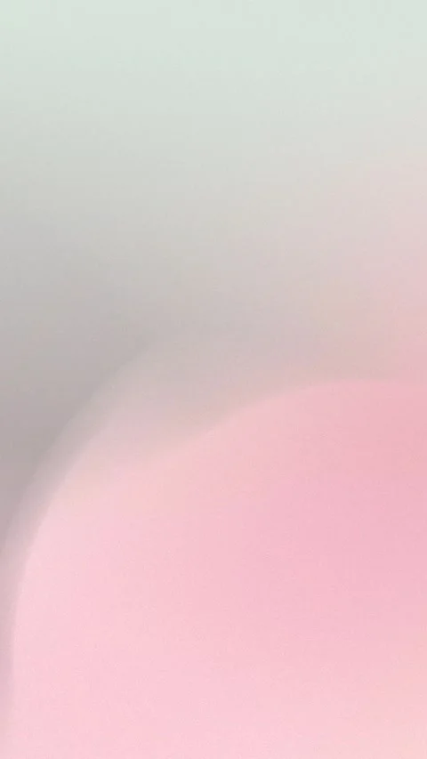 Soft pastel gradient with pink and gray tones, seamless loop background in 4K. Stockbeeldmateriaal 309957010