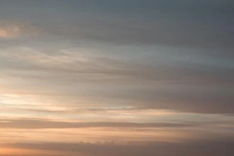 Soft Pastel Sunset Clouds in the Sky Фото