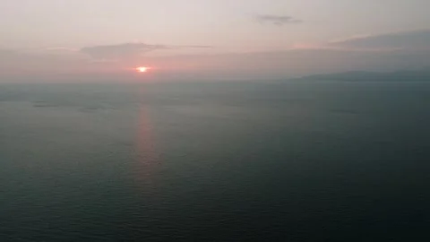 Soft pastel sunset over tranquil ocean waters. Ko Pha Ngan, Thailand. Stock Footage 301946459