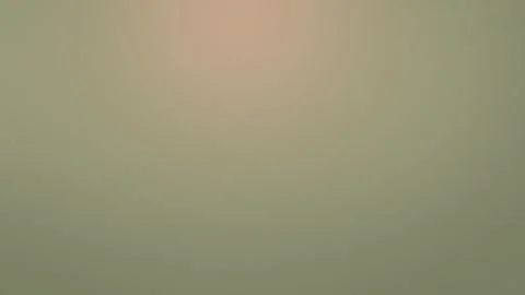 Soft peach and olive gradient with subtle texture creates a seamless loop Vídeo Stock 309956213