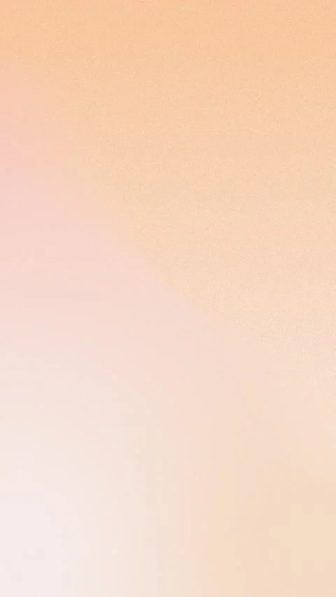 Soft peach and pink gradient with fine grain texture, creating a calm seamless 動画素材 310143449