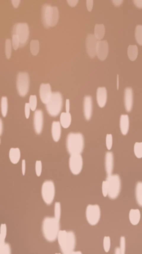 Soft peach bokeh circles on blurry background. 2d animation Stock Footage 345393891