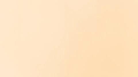 Soft peach hues flow like a calm morning sun, warming the cement wall with .. Stock Illustration