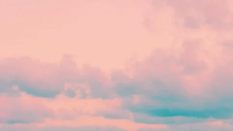 Soft Peach Orange Sunset Sky and Puffy Pink Blue Clouds Time Lapse Beautiful Air Stock Footage 297858587