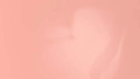 Soft pink abstract seamless loop background. Warm peach hues blend smoothly. 4K. Vídeos de archivo 309856043