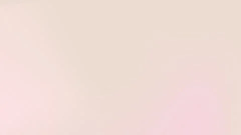 Soft pink and beige gradient texture with subtle grain. Seamless loop Stock Footage 309955843