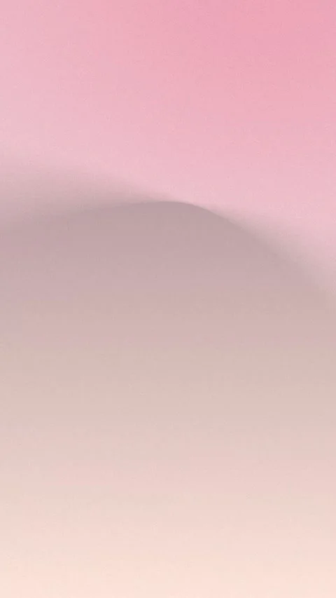 Soft pink and beige gradient with a smooth wave shape, seamless loop background. 動画素材 309956974