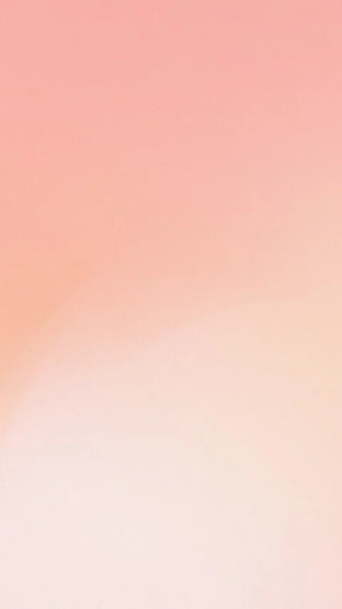 Soft pink and peach gradient with subtle grain texture. Seamless loop Stock Footage 309856193