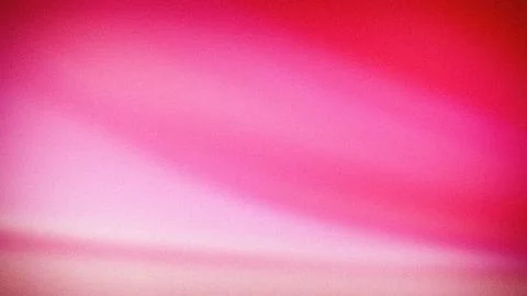 A soft pink and red gradient with a smooth, grainy texture in 4K resolution.. Stockillustratie