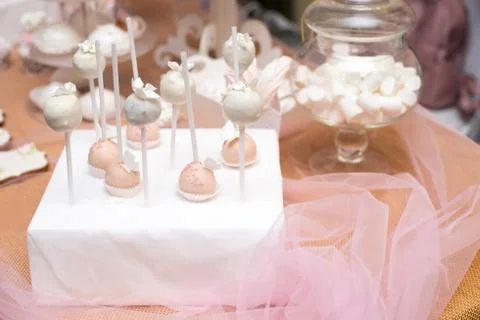 Soft pink cake pops on the background of the candy bar Stock-Fotos