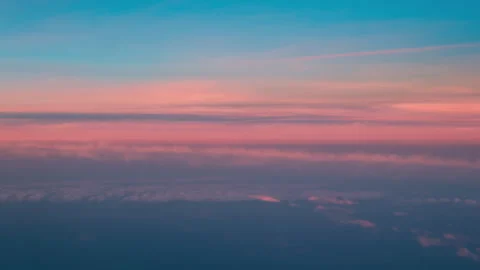 Soft Pink Cloud Bands and Blue Atmospheric Sky Gradients Stock Footage 337903198