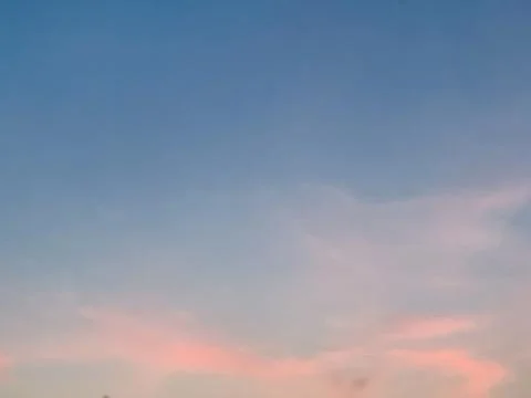 Soft Pink Cloud Formation Against Blue Sky in Jakarta Indonesia Stock Photos
