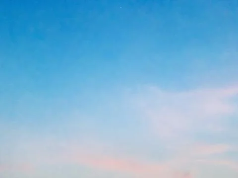 Soft Pink Cloud Formation Against Blue Sky in Jakarta Indonesia Stock Photos