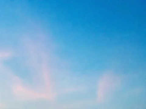 Soft Pink Cloud Formation Against Blue Sky in Jakarta Indonesia Stock Photos