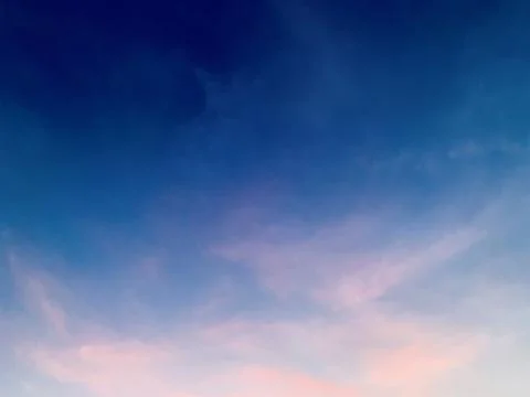 Soft Pink Clouds over Deep Blue Dusk Sky Image Jakarta Indonesia Stock Photos