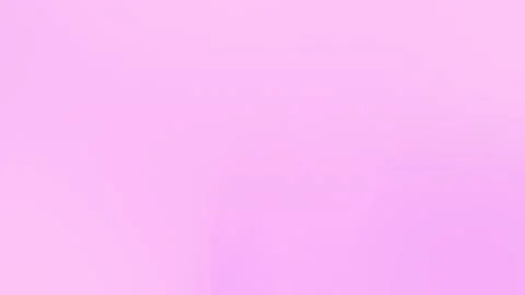 Soft pink gradient with smooth transitions in seamless loop background. 4K Stockbeeldmateriaal 309955704